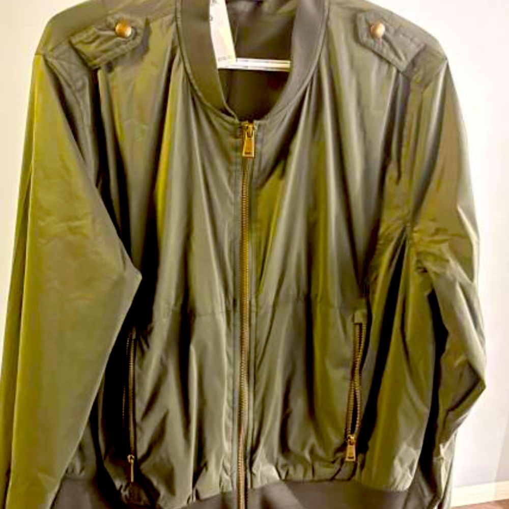 Light weight, great for layering can be dressed up or down.